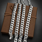 Silver chain belt on a brown fabric background
