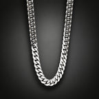 Silver chain necklace on a cardboard box