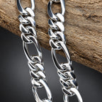 Silver chain necklace on a wooden surface
