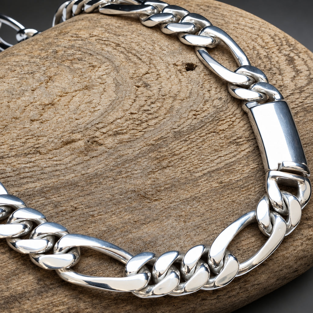 Silver chain bracelet on a wooden surface