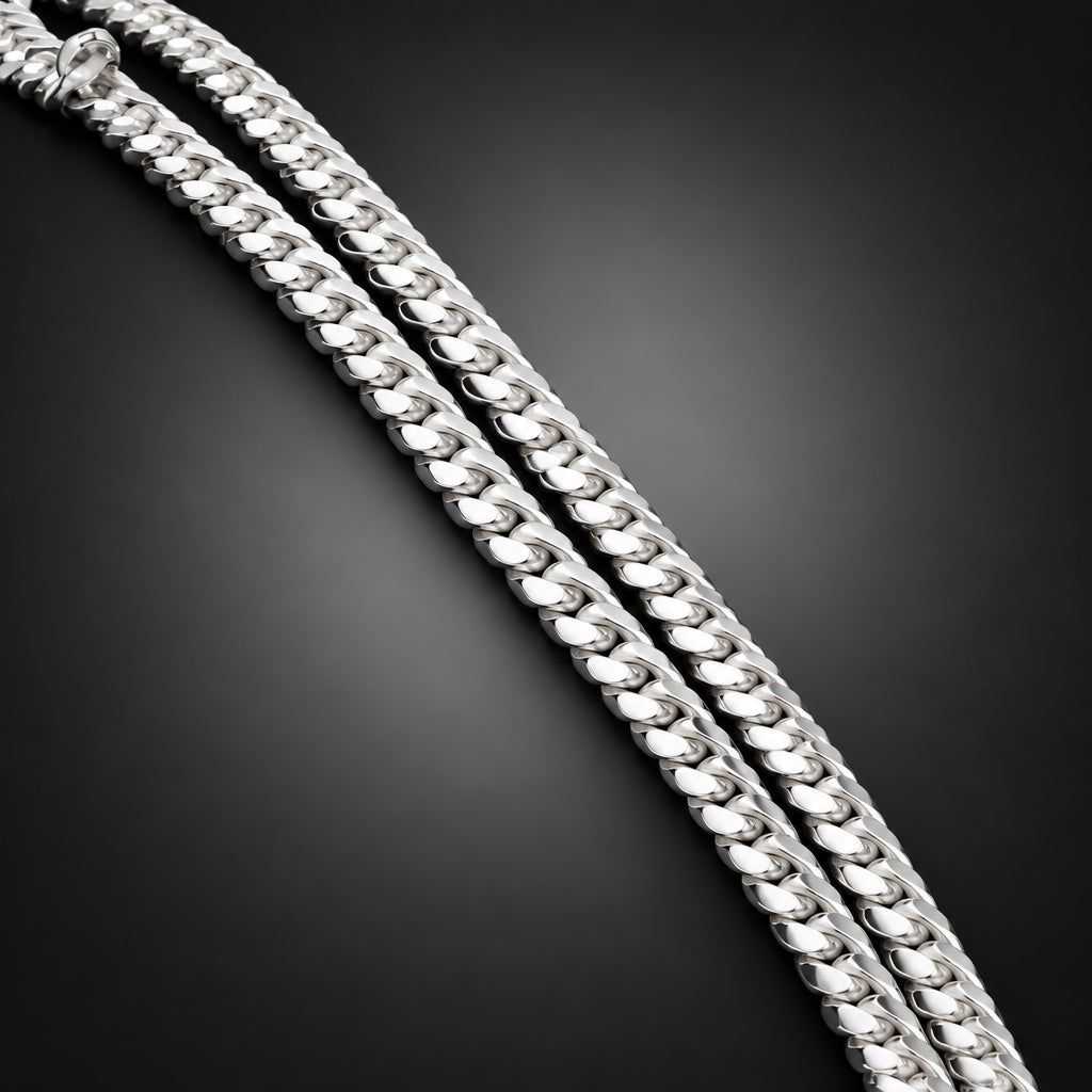 Gold chain on a dark surface