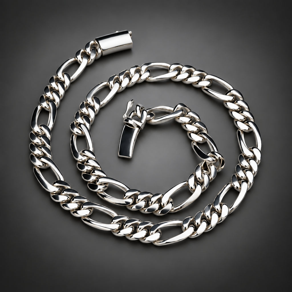 A polished silver-tone metal chain necklace with a curb-style link pattern, coiled on a dark gray gradient background.