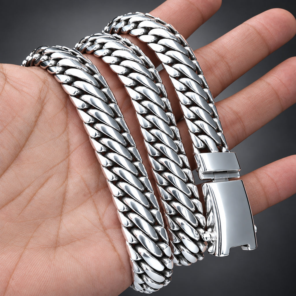 Silver chain bracelet on a hand with a blurred background