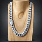 Silver chain necklace on a wooden block