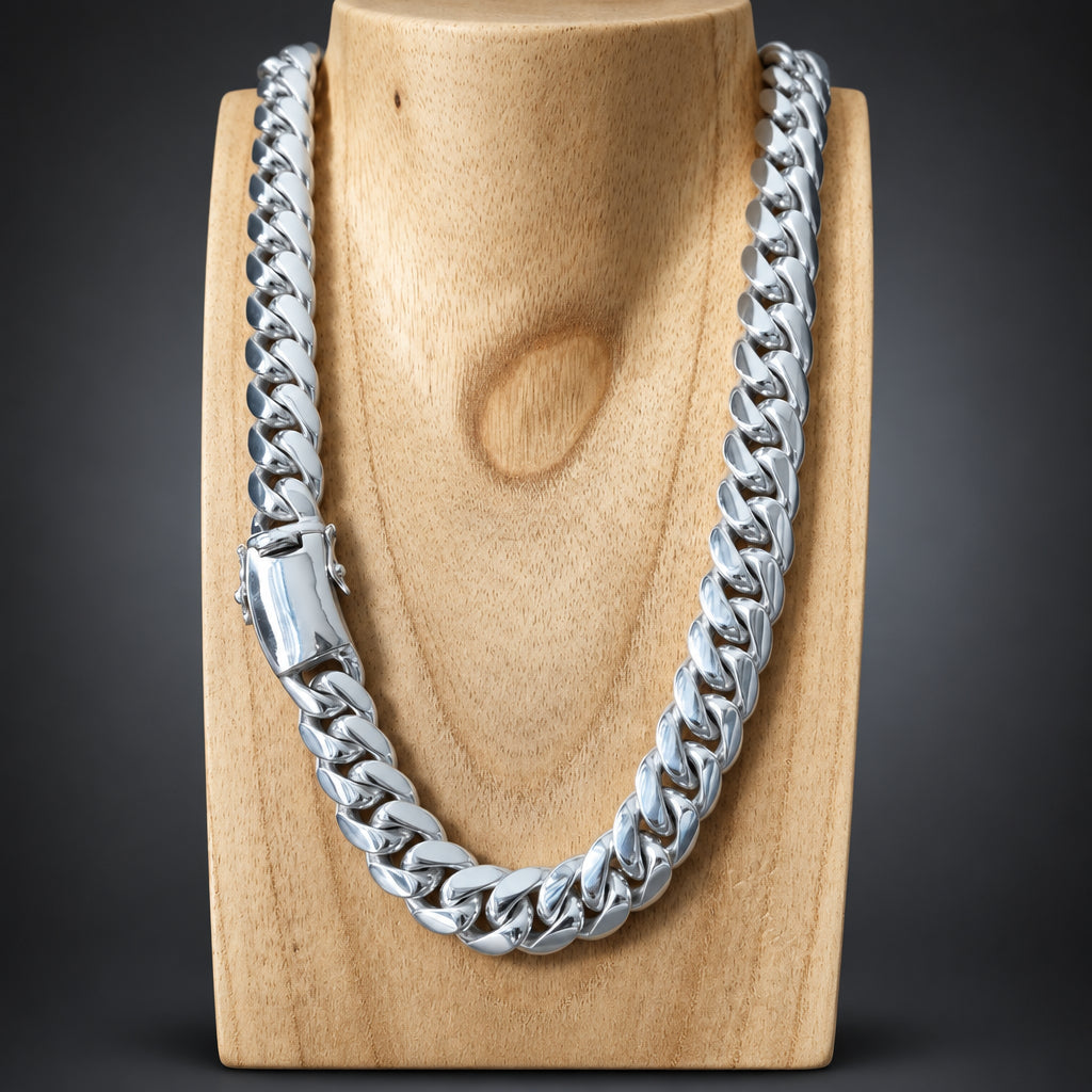 Silver chain necklace on a wooden block