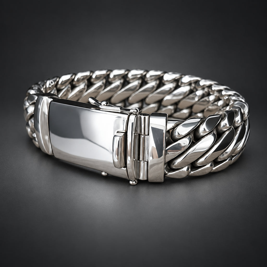 Silver bracelet with a clasp on a wooden surface