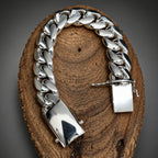 Silver chain bracelet on a wooden surface