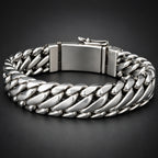 Silver chain bracelet on a dark background