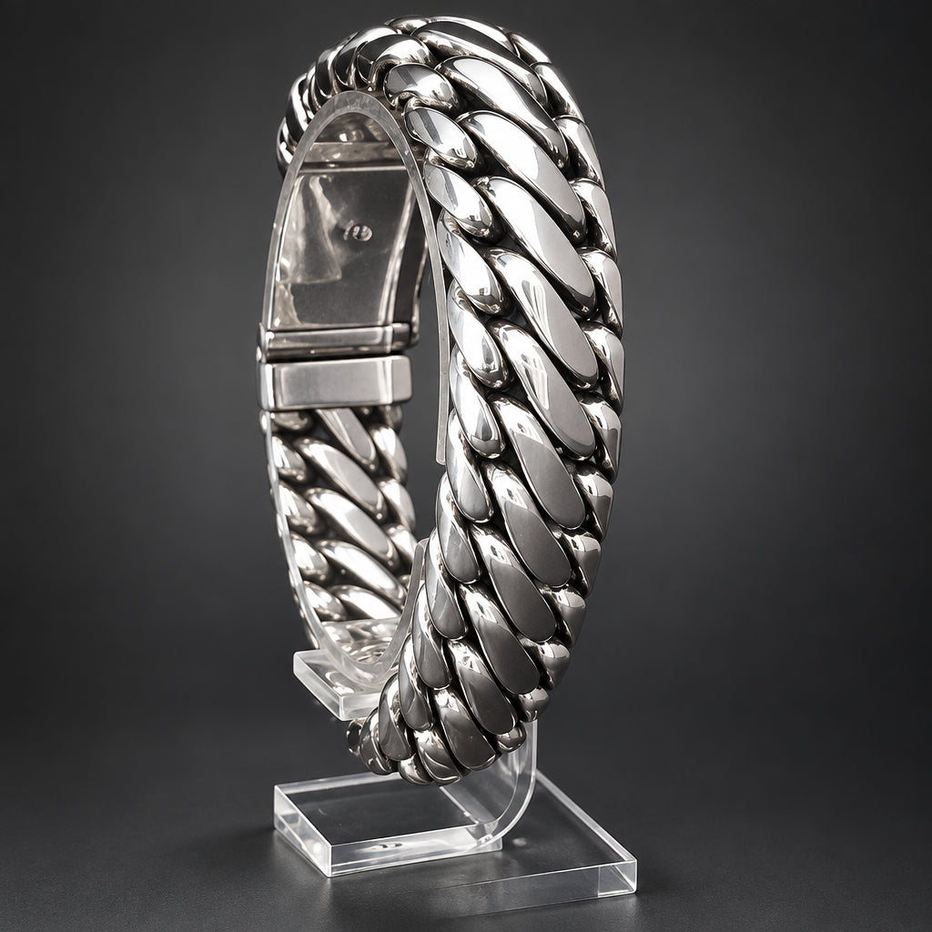 Silver braided bracelet on a black background