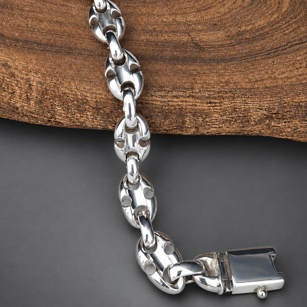 Silver chain bracelet on a wooden surface