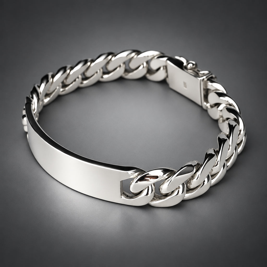 Silver chain bracelet on a light gray background