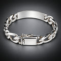 A polished silver-tone metal chain bracelet with a rectangular ID plate and a secure clasp, shown on a neutral gray background.