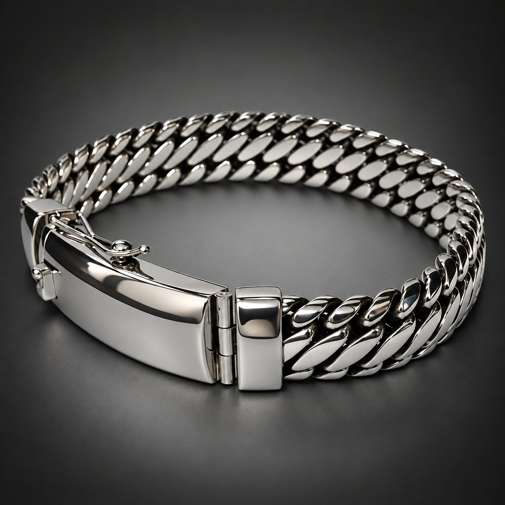 A silver-toned metal bracelet with a curb chain pattern and a polished clasp, shown on a neutral light gray background.