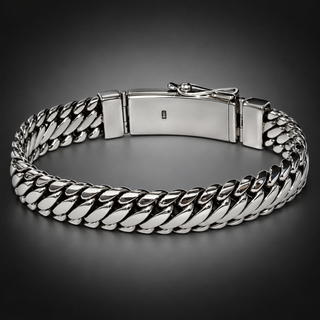 Silver chain bracelet on a gray background