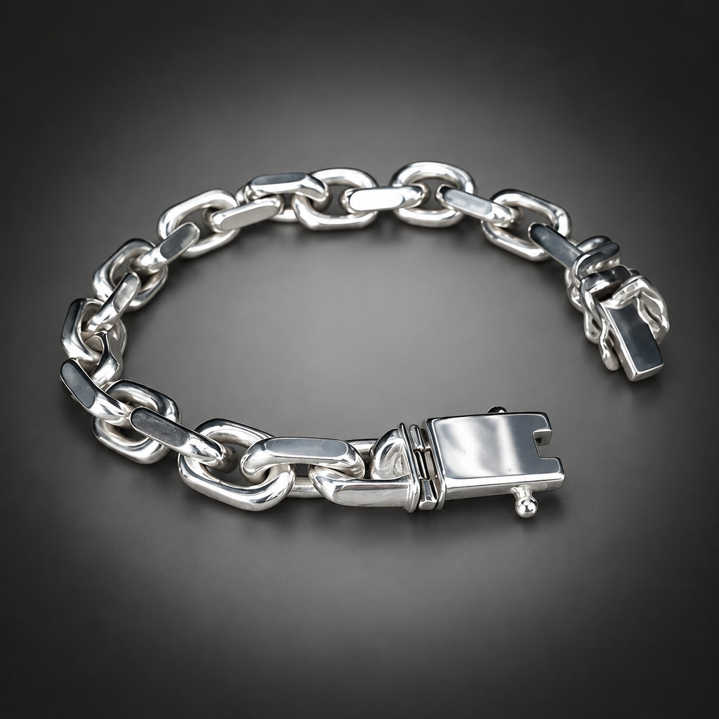 Silver chain bracelet on a wooden surface