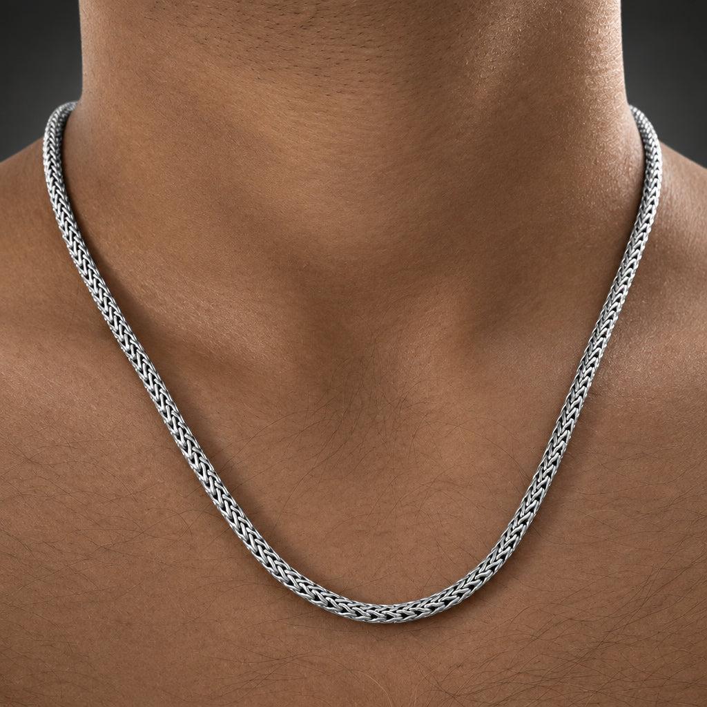 Silver chain necklace on a mannequin neck