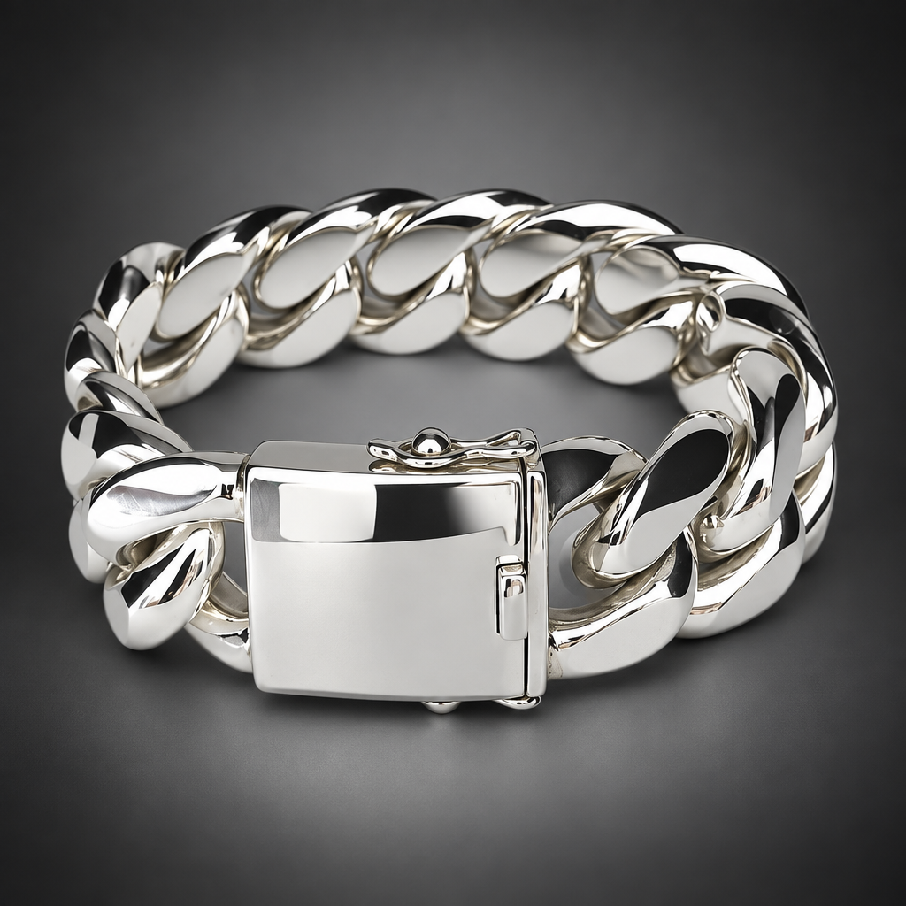 Silver chain bracelet on a light gray background