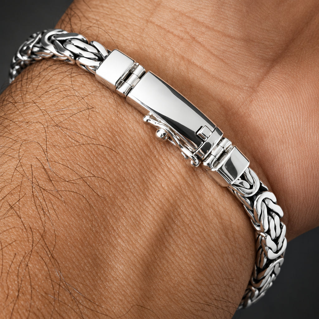 Silver bracelet on a wrist with a close-up view